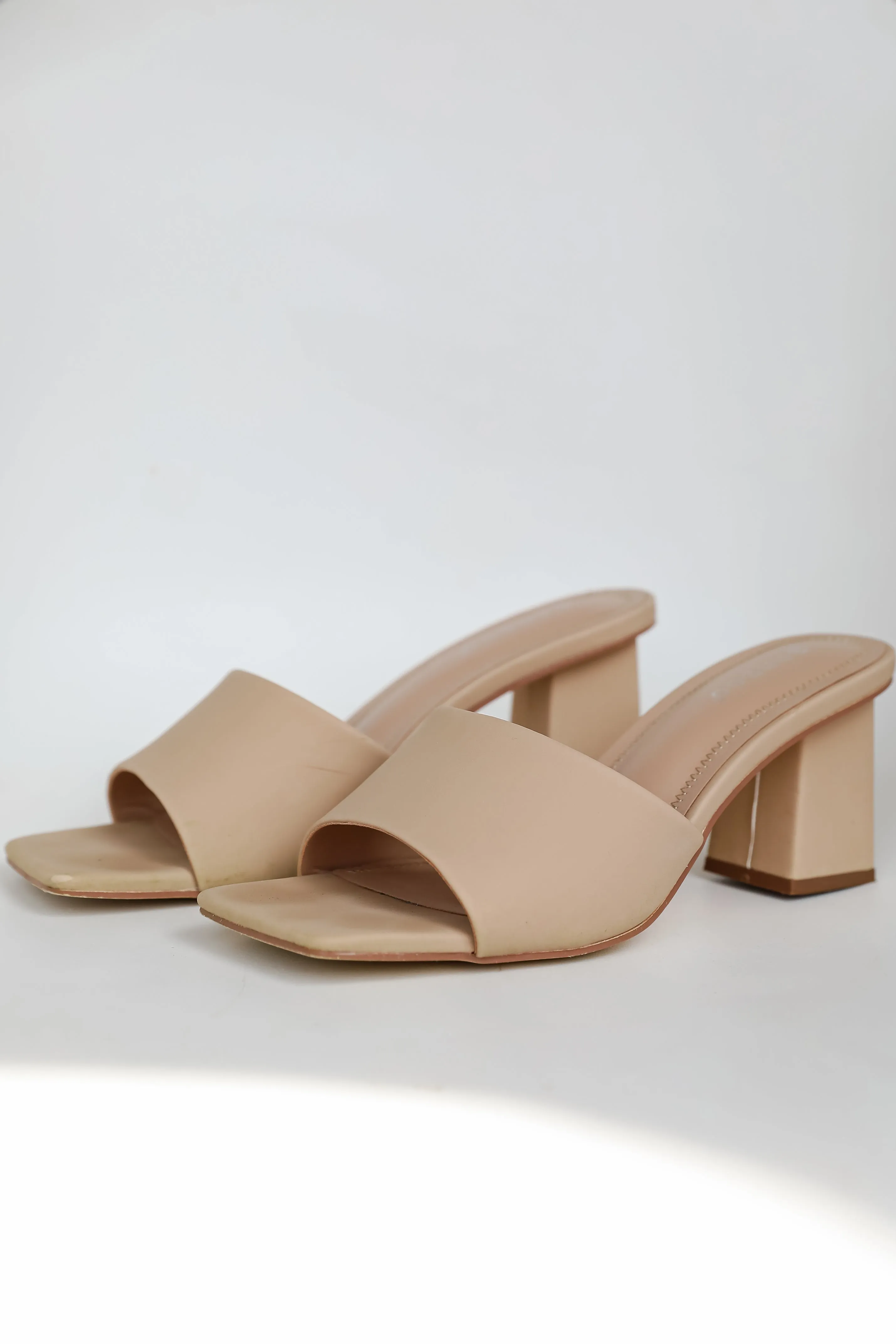 Elegant Elevation Nude Slide Heels